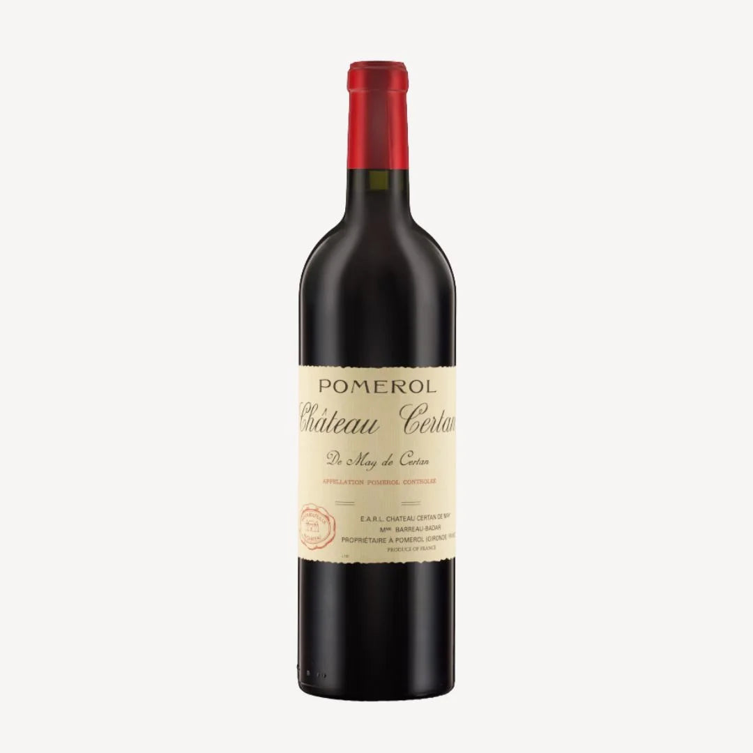 Bottle of Château Certan de May 2019 with a cream-colored label featuring the Pomerol appellation and producer details.